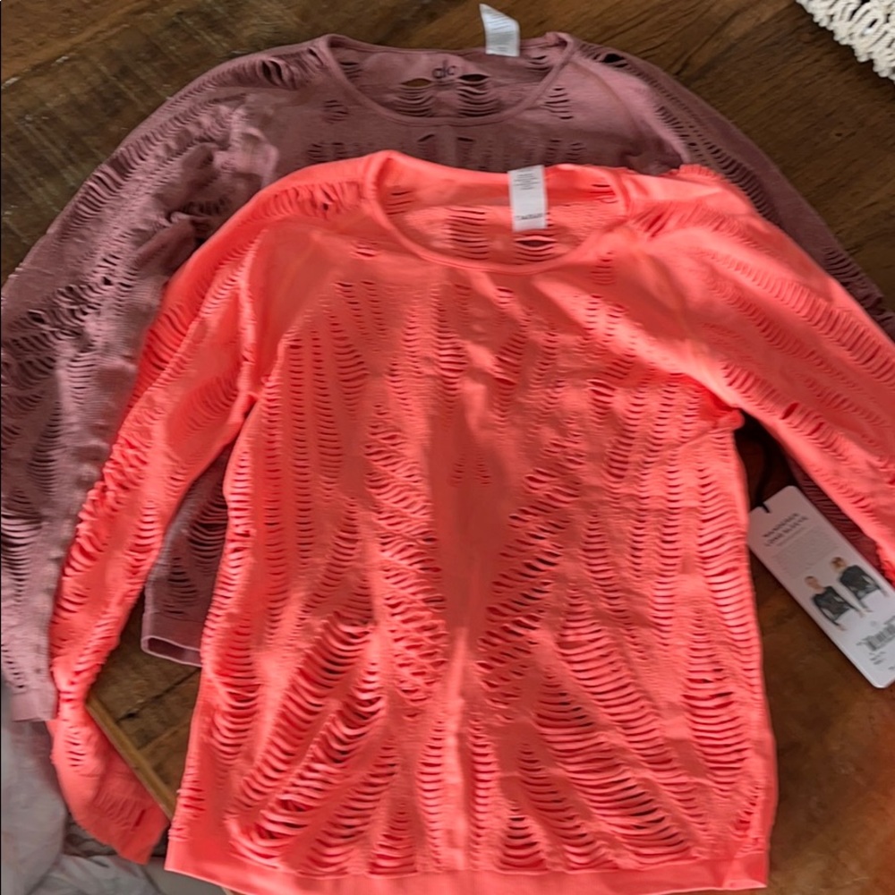 Two Alo Yoga Wanderer long sleeve tops